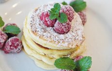 Pancake for breakfast with raspberries